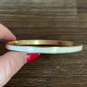 White and gold Kate Spade thin enamale bracelet